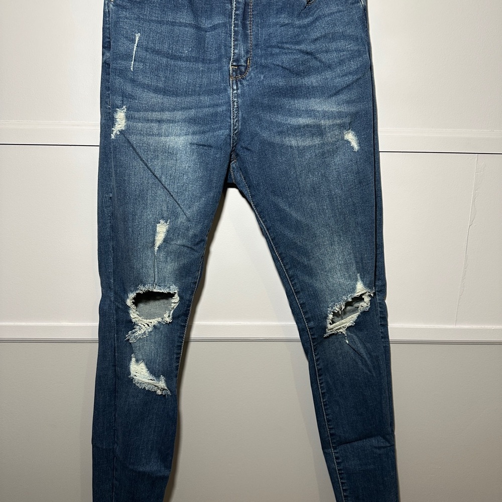 Distressed Blue Jeans